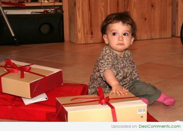 Baby with gifts