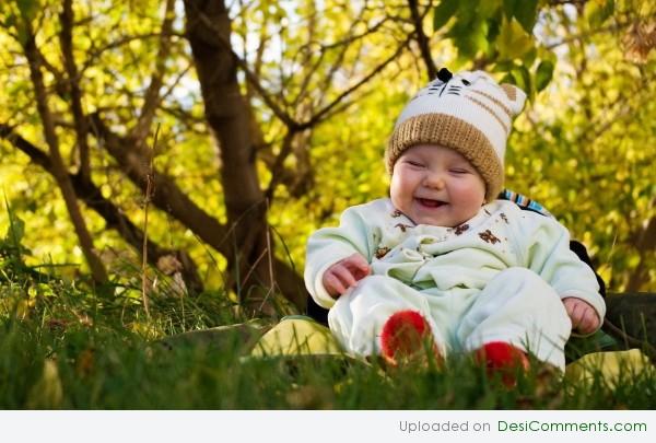 Baby Playing On grass