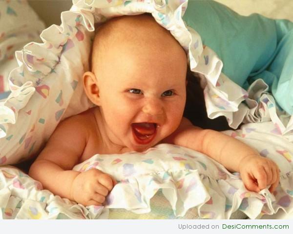 Baby Playing With Pillow