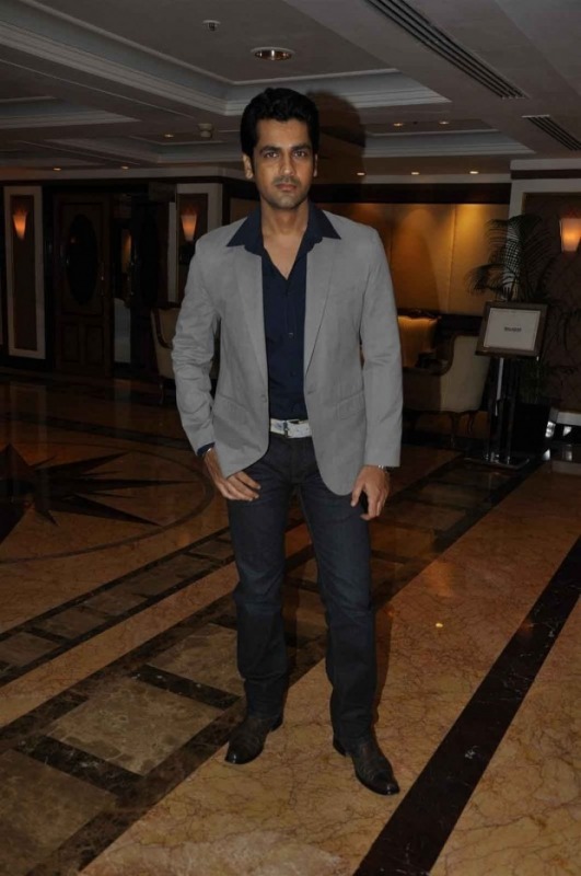 Arjan Bajwa in Gery Coat