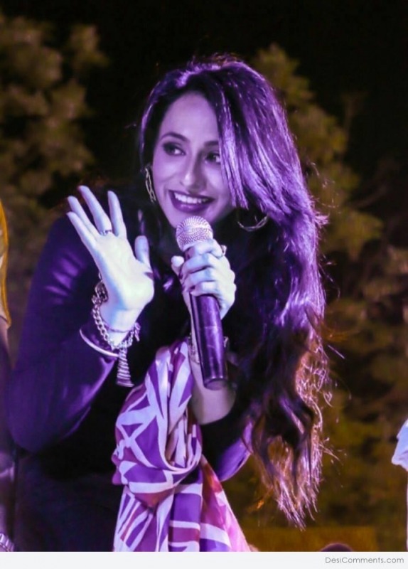 Keeya Khanna Holding Mic