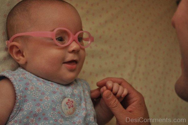 Little Baby With Pink Glasses