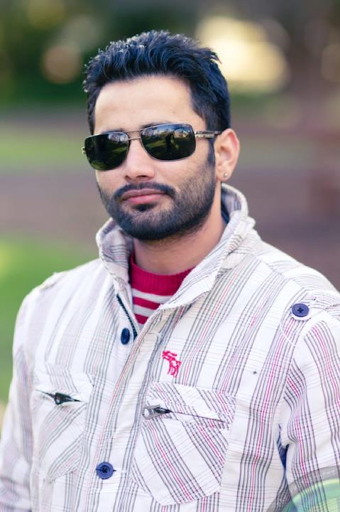 Maninder Batth Wearing Sunglasses